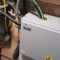 a close up of a power box and wires