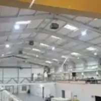 a large room with a lot of lights on the ceiling