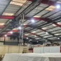a large room with a lot of tables and chairs
