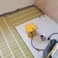 a room with a white floor and a yellow object on the floor